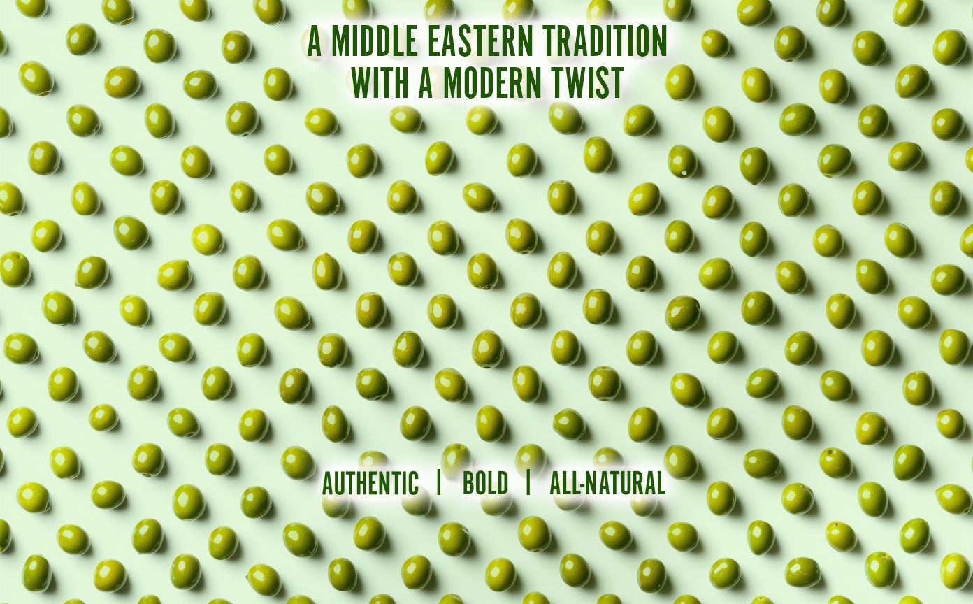 teta's olives homepage background, text saying "a middle eastern tradition with a modern twist. authenitc, bold, all-natural". against a background consisting of scattered whole green olives.