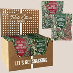 24 pack variety snack box of teta's olives classic citrus herb infusion and fiery hot thai pepper against a light brown background