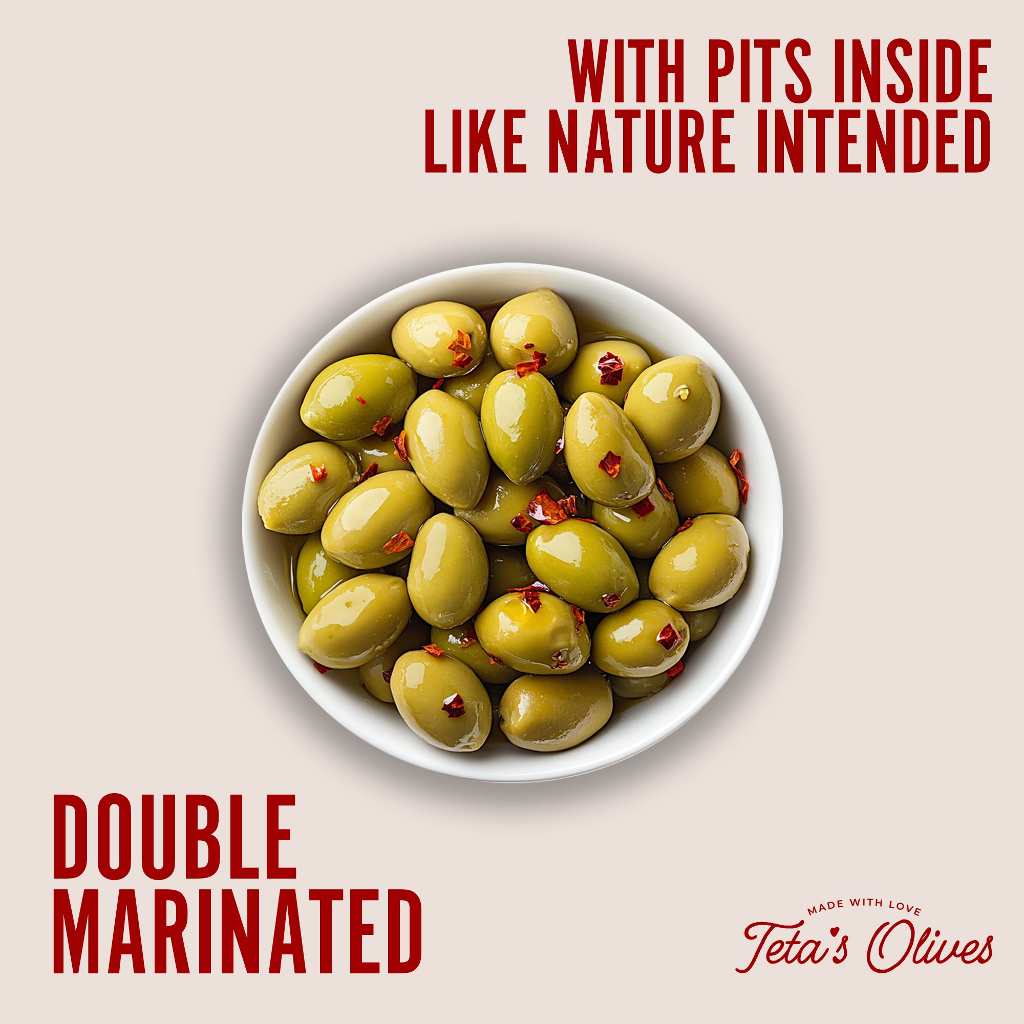 image of a plate of whole green olives with crushed peppers, with text saying "with pits inside like nature intended" and "double marinated" with teta's olives logo