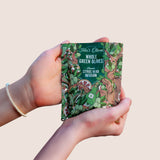 teta's olives, close up, classic citrus herb infusion snack bag, in hands against a nature background